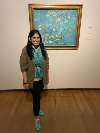 Art teacher Hera Jhaveri in front of Almond Blossom in the Van Gogh Museum in Amsterdam.