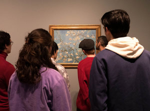 Visitors are looking at Vincent van Gogh's painting Almond Blossom at the Van Gogh Museum