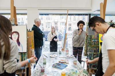 Students participating in a painting workshop. Photo by: Jaasir Linge (2019)