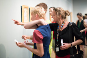 A museum guide points out something special in the museum to two students during a tour for secondary education. Photo: Brenda Roos